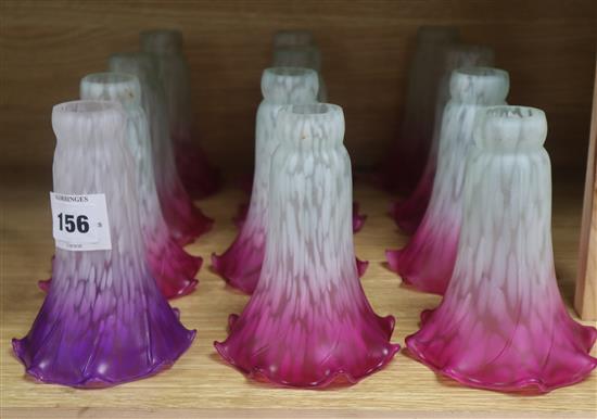 A set of twelve opaque glass lamp shades